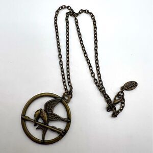 *3/$20* Hunger Games Mockingjay bronze tone necklace